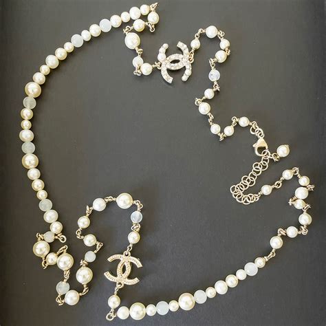 fake chanel long pearl necklace|chanel pearl necklace retail price.